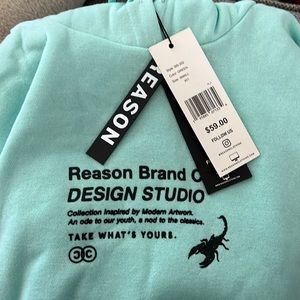 Tiffany’s blue Reason, tags attached and bag included